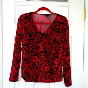 Red and black blouse with black under shell.